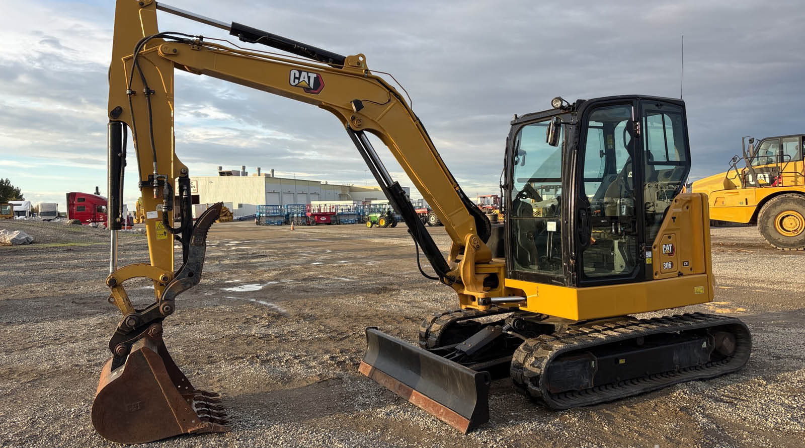 Cat compact track loader with bucket lowered